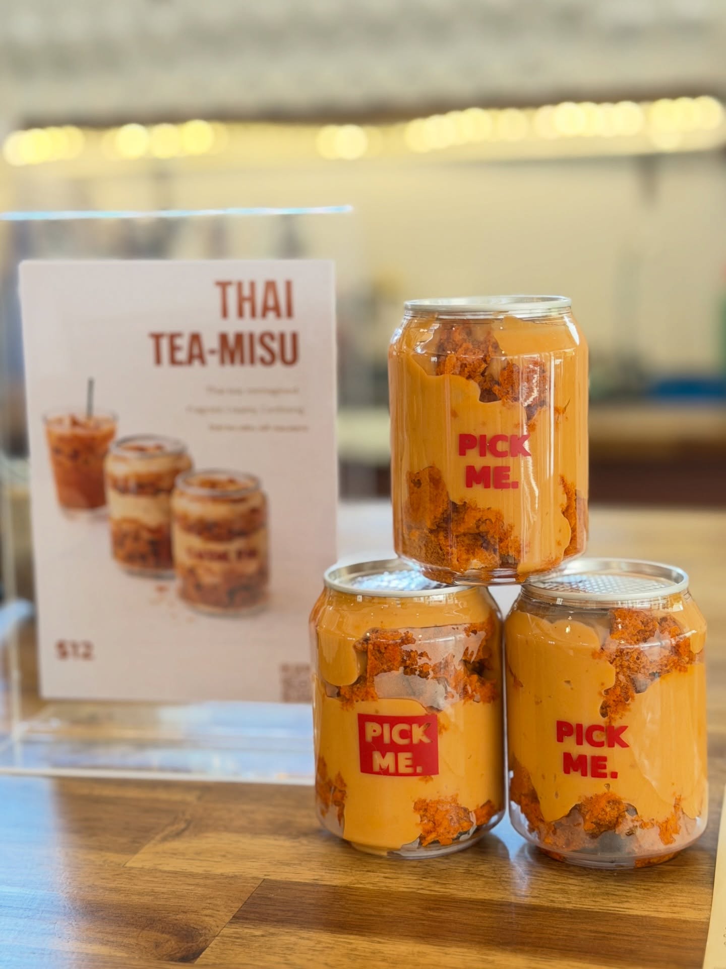 Thai Tea-misu cans stacked with Pick Me Up branding at Brisbane City Markets